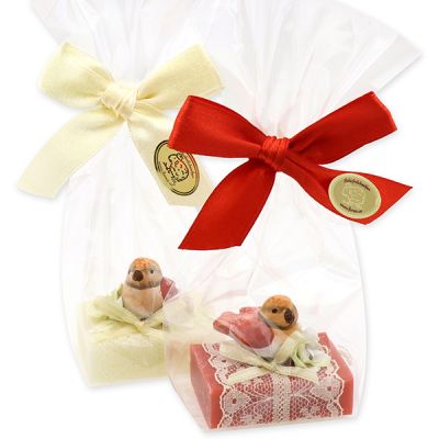 Sheep milk guest soap 25g decorated with a bird in a cellophane bag, Classic/Pomegranate 